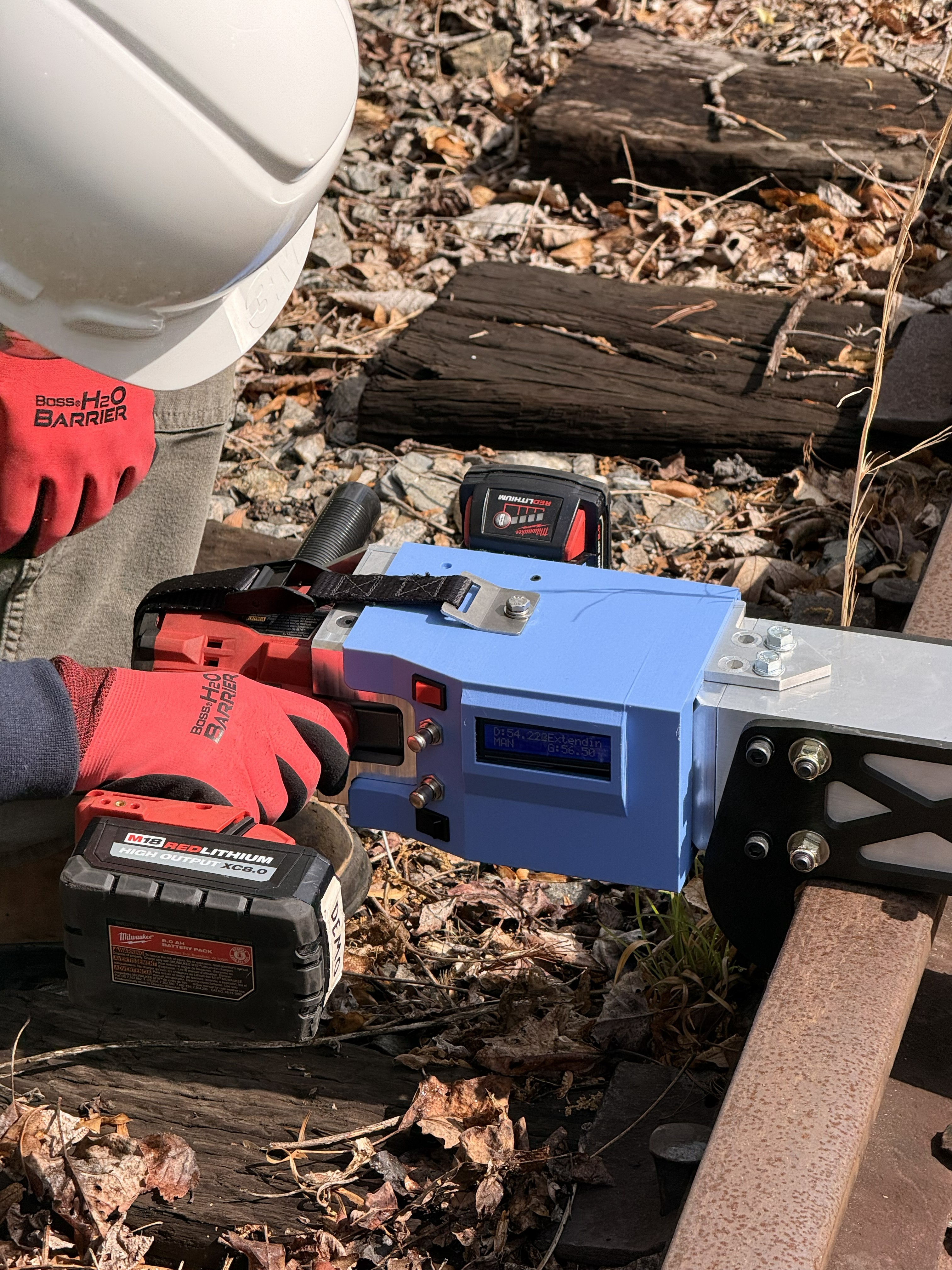 Railroad gauge spreader control placeholder